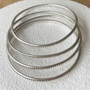 Bundle of four bracelets